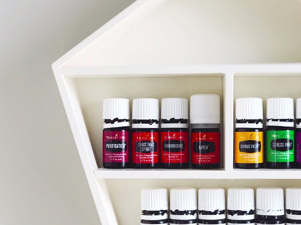 Make this $5 DIY oil shelf in just one day for your growing essential oils collection!