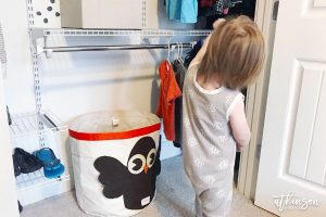 Even boys need organization ... that's why I set out to create this organized shared closet for brothers! Using a DIY closet system, we created a tiny but functional closet for boys who share a room. Click to see more!