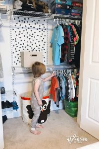 Even boys need organization ... that's why I set out to create this organized shared closet for brothers! Using a DIY closet system, we created a tiny but functional closet for boys who share a room. Click to see more!