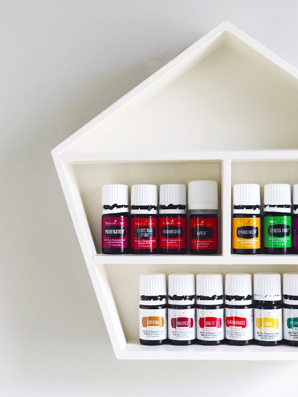 Make this $5 DIY oil shelf in just one day for your growing essential oils collection!