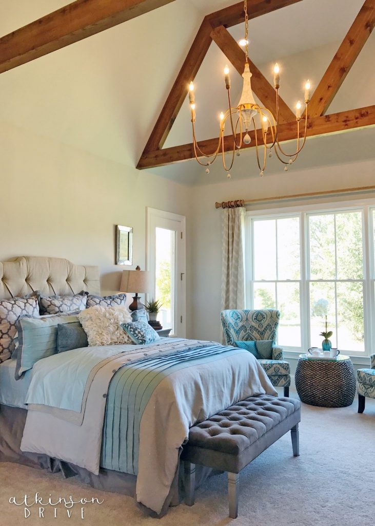 Bright and airy master bedroom with beautiful ceiling beams /// Woodridge Parade of Homes Tour by Atkinson Drive